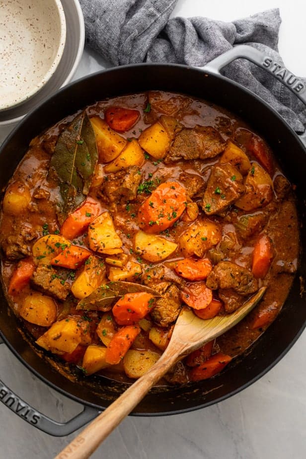 Beef stew in a large pot after it's done cooking