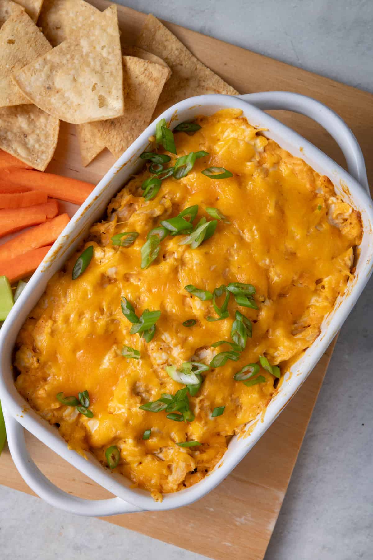 Healthy buffalo chicken dip served with veggies and chips