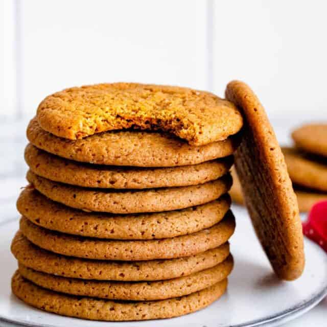 Stack of cardamom spiced cookies on a small plate