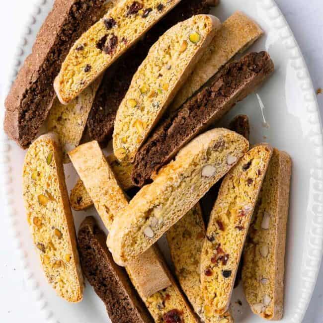 Four biscotti flavors on an oval platter.