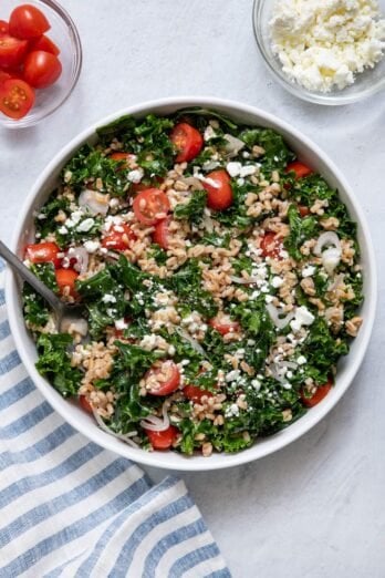 Overhead shot of farro salad in large white serving dish.