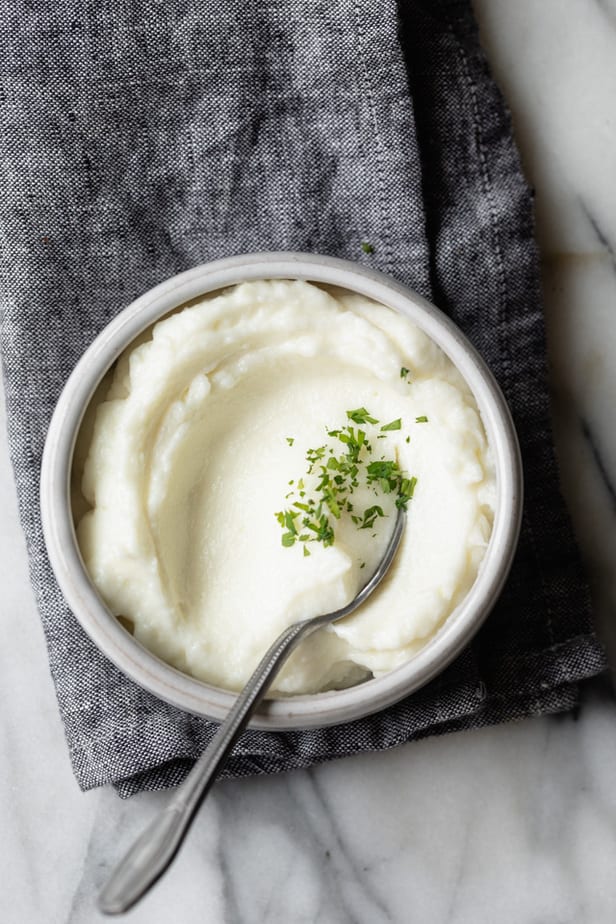 Lebanese Garlic Sauce with spoon inside