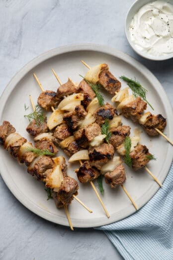 Grilled lamb kabobs served with tzatziki sauce