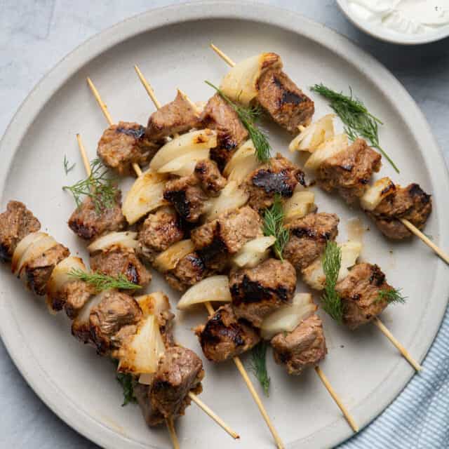 Grilled lamb kabobs served with tzatziki sauce