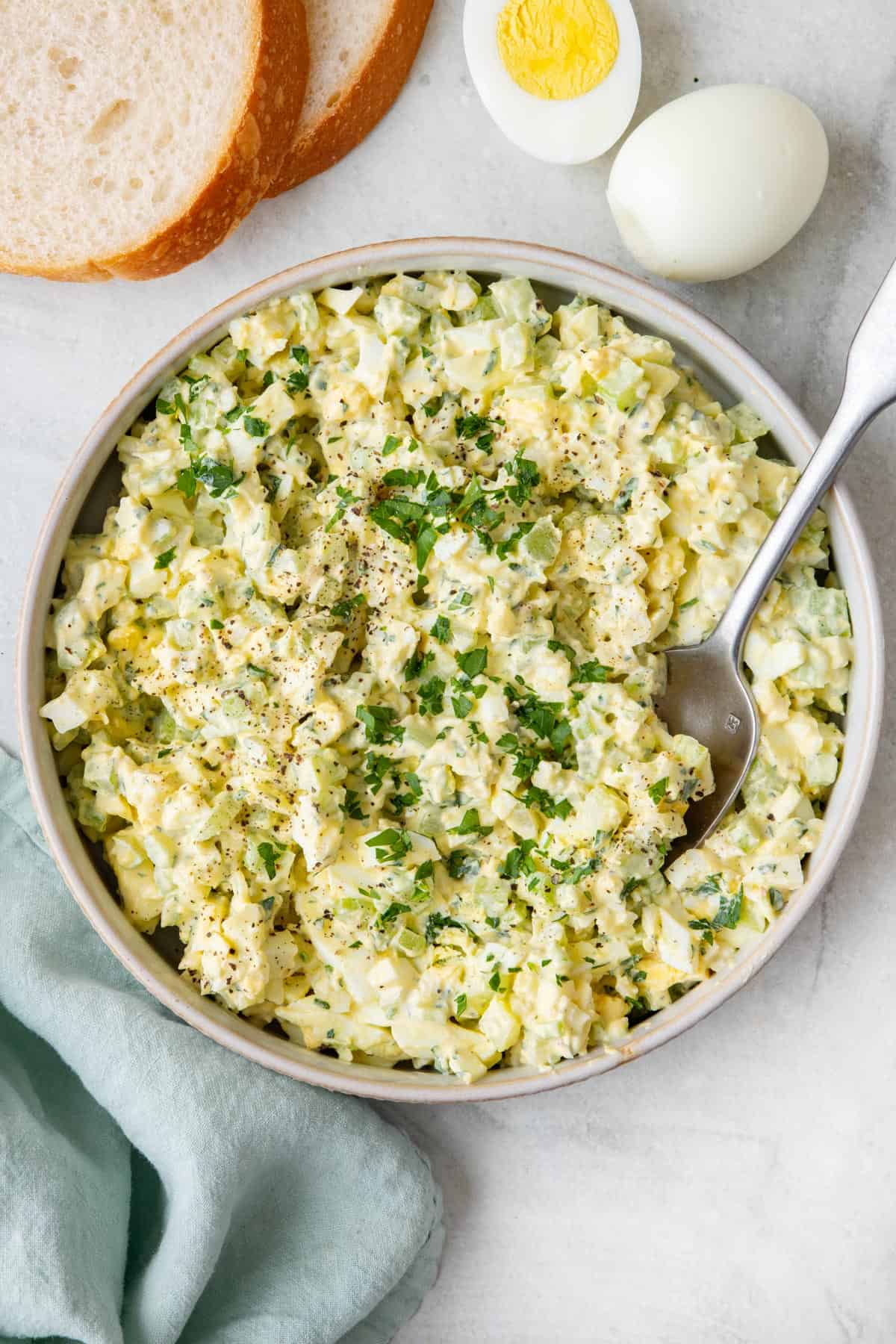 Close up shot to show texture of the healthy egg salad served in a salad