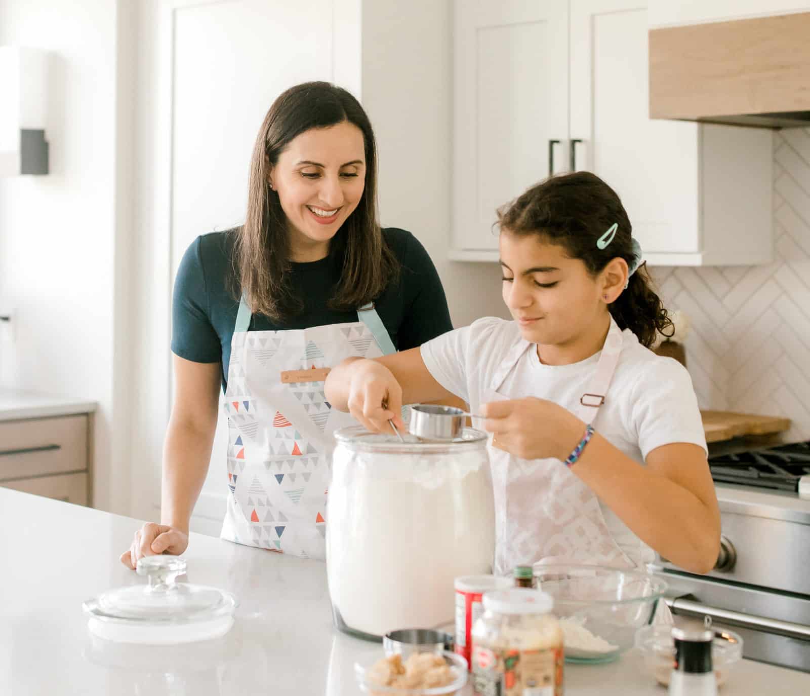 Yumna and kids in kitchen making cookies