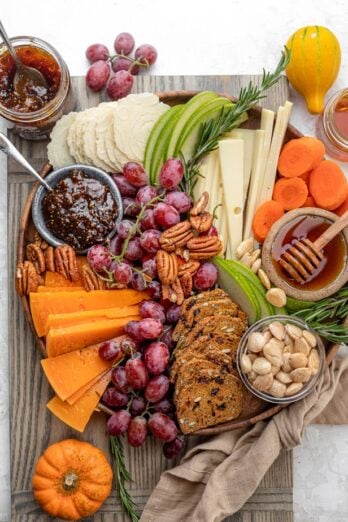 a beautiful cheese board laid out on a table