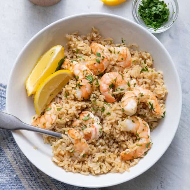 a close up of lemon herb shrimp stir fry