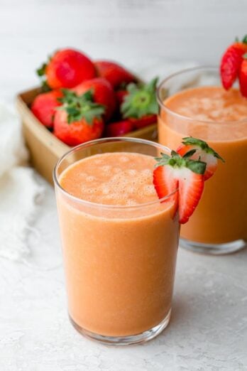 side shot of strawberry mango smoothie in a glass