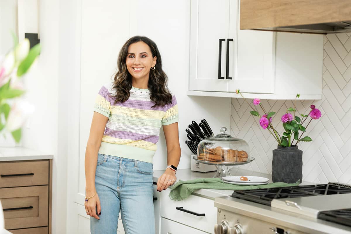 Feel Good Foodie Yumna in kitchen with vegetables