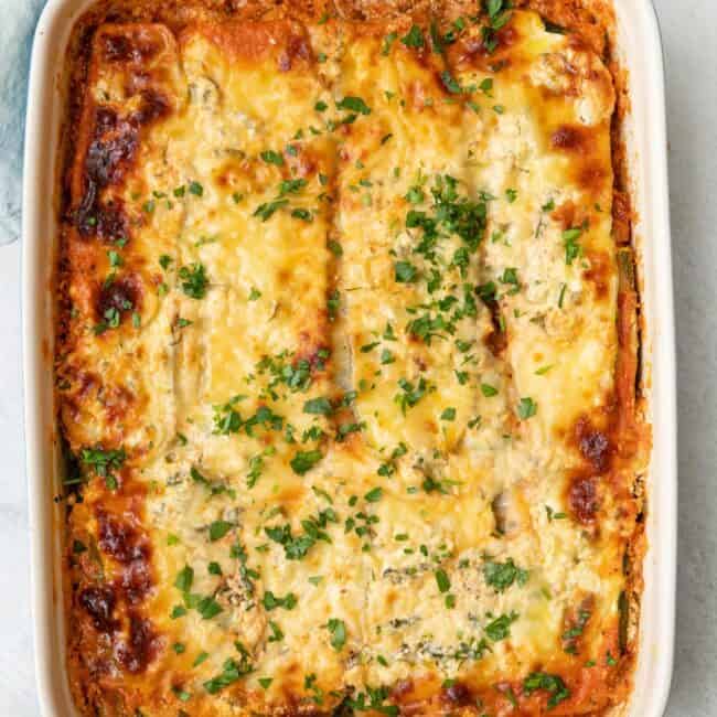 Zucchini lasagna in a baking dish.